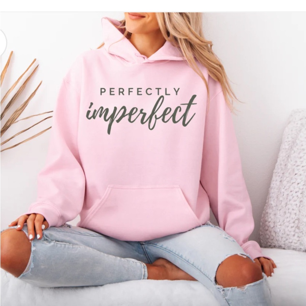 NWT Sweatshirt w/black lettering “Perfectly imperfect”. Pit to pit 23 inches. 🩷🩷